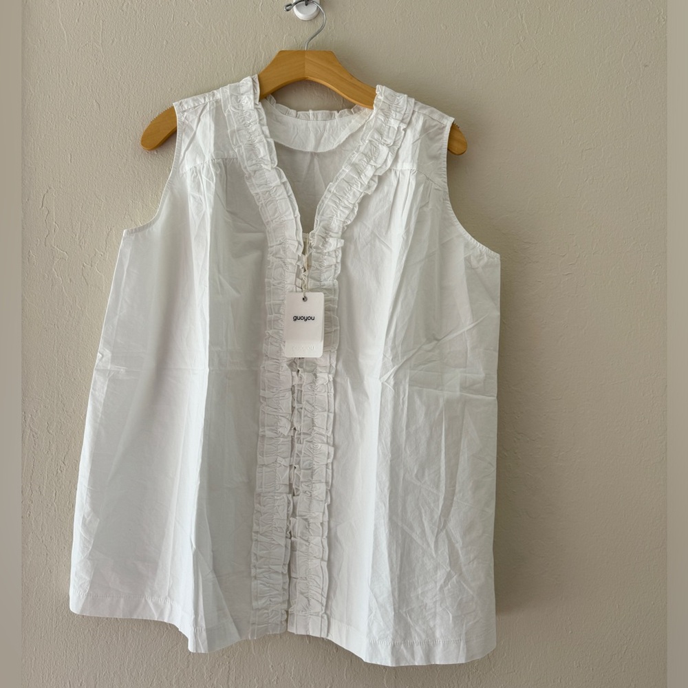 White Sleeveless Ruffle Top